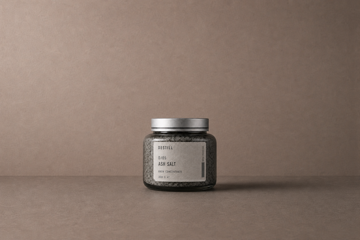 Ash Salt — Mineral Bath Concentrate by DESTILL on a dusty mineral clay background