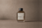 Cedar Halo — Eau de Parfum by DESTILL on a dusty mineral clay background