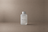 Mineral Thread — Weightless Conditioner by DESTILL on a dusty mineral clay background