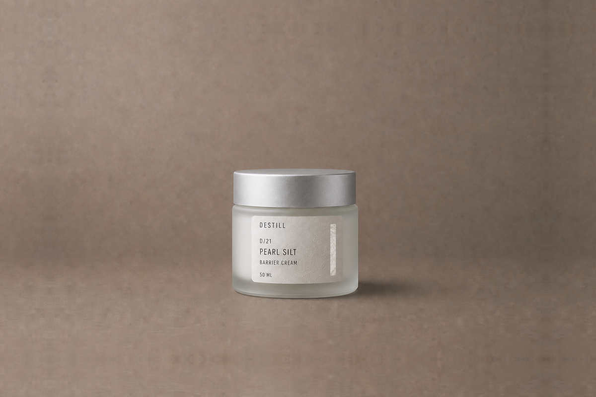 Pearl Silt — Barrier Cream by DESTILL on a dusty mineral clay background