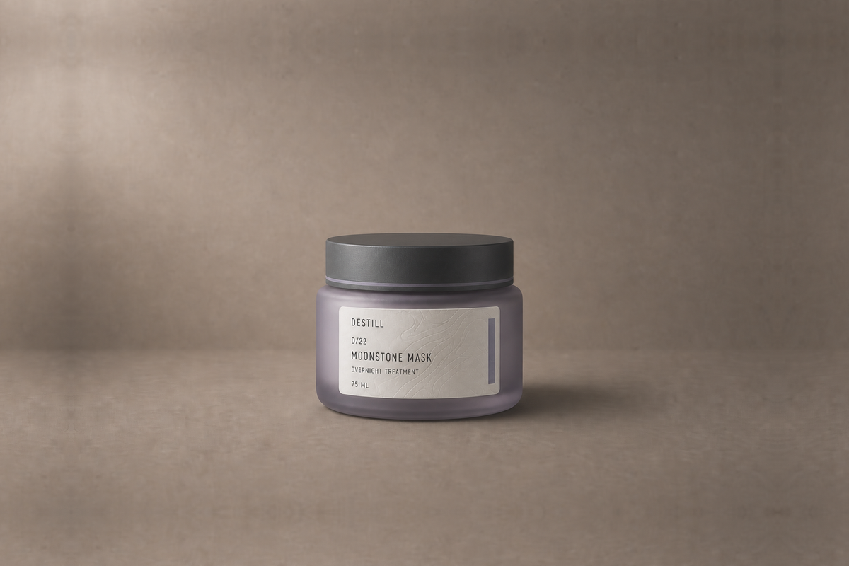 Moonstone Mask — Overnight Treatment by DESTILL on a dusty mineral clay background