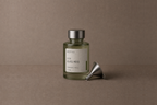 Glass Moss — Fragrance Refill by DESTILL on a dusty mineral clay background